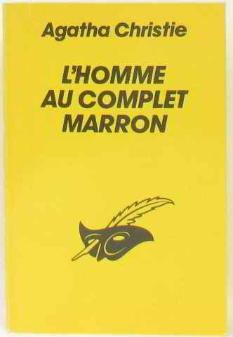 l'homme au complet marron