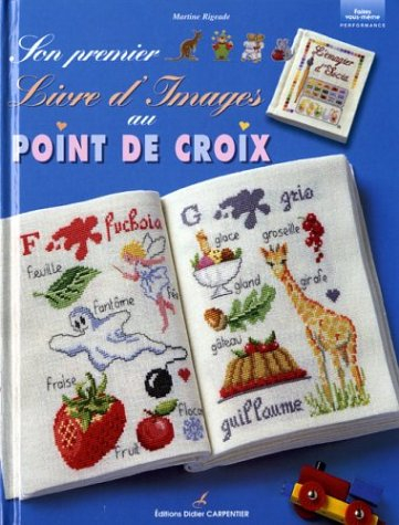 Son premier livre d'images au point de croix
