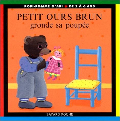 petit ours brun gronde sa poupée