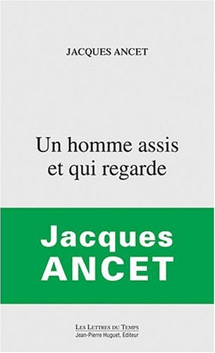 Un homme assis et qui regarde